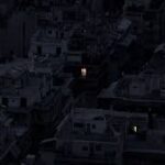 This photo is opaque black with a single point in the middle. It is titled, "The Stunning Loneliness of Megacities at Night." From Wired Magazine. April, 2019.
