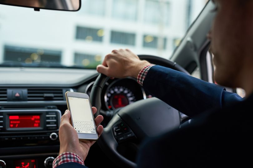 Drivers Hold Phones…Why?